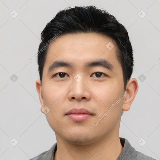 Neutral asian young-adult male with short  black hair and brown eyes