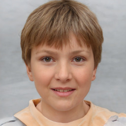 Joyful white child female with short  brown hair and brown eyes