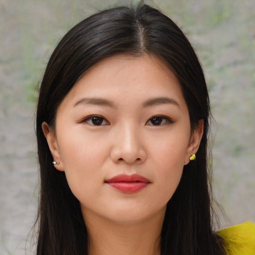 Neutral asian young-adult female with medium  brown hair and brown eyes