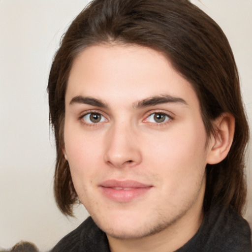 Neutral white young-adult male with medium  brown hair and brown eyes