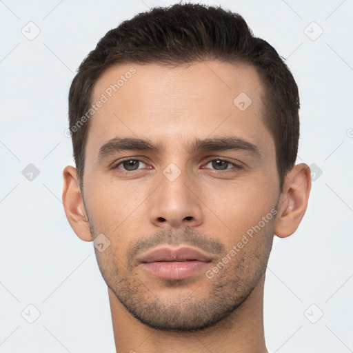 Neutral white young-adult male with short  brown hair and brown eyes