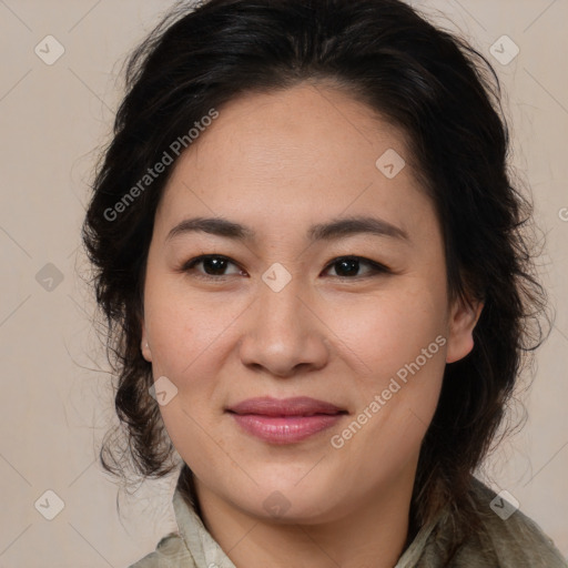 Joyful asian young-adult female with medium  brown hair and brown eyes