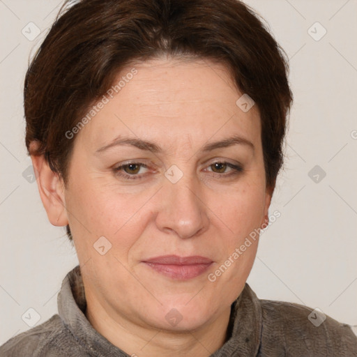 Joyful white adult female with short  brown hair and brown eyes