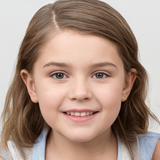 Joyful white child female with medium  brown hair and grey eyes