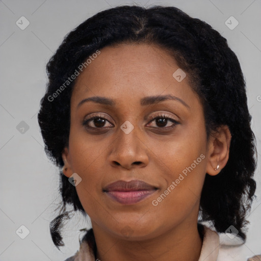 Joyful black young-adult female with medium  black hair and brown eyes