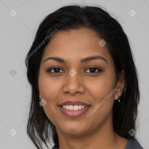 Joyful latino young-adult female with long  brown hair and brown eyes