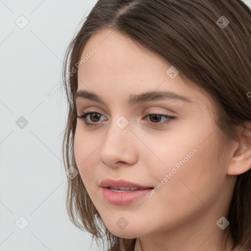 Neutral white young-adult female with long  brown hair and brown eyes