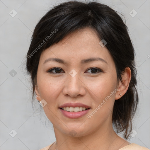 Joyful asian young-adult female with medium  brown hair and brown eyes