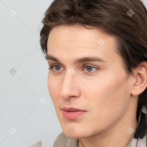 Neutral white young-adult male with medium  brown hair and brown eyes