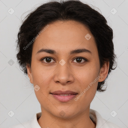 Joyful latino young-adult female with short  brown hair and brown eyes