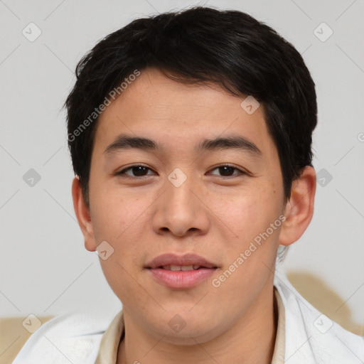 Joyful asian young-adult male with short  brown hair and brown eyes