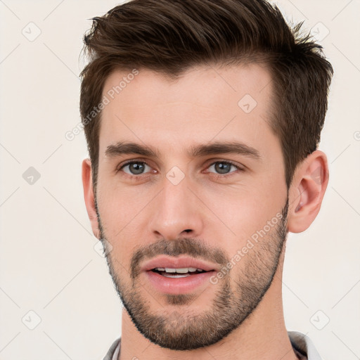 Neutral white young-adult male with short  brown hair and brown eyes