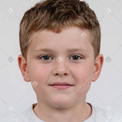 Joyful white child male with short  brown hair and brown eyes