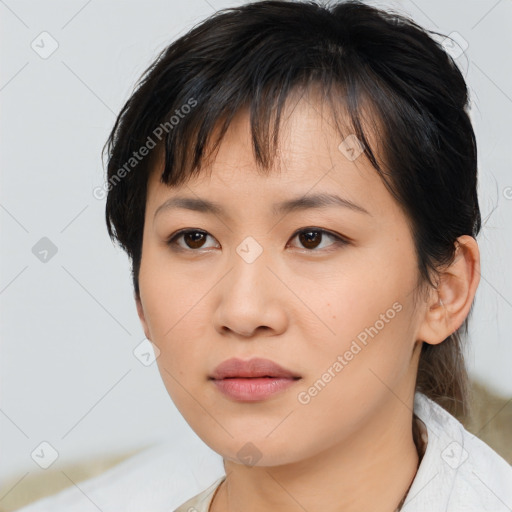 Neutral asian young-adult female with medium  brown hair and brown eyes