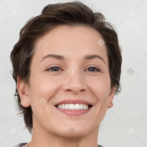 Joyful white adult female with short  brown hair and brown eyes