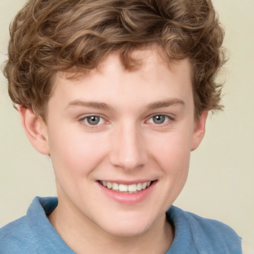 Joyful white child male with short  brown hair and brown eyes