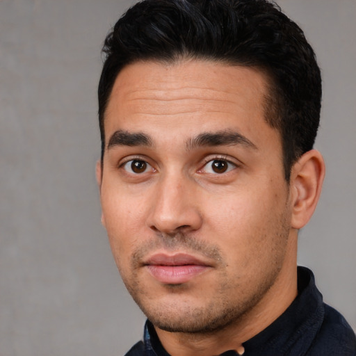 Neutral white adult male with short  black hair and brown eyes