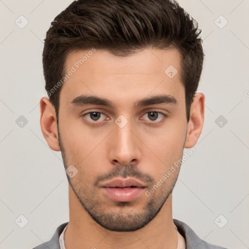 Neutral white young-adult male with short  brown hair and brown eyes