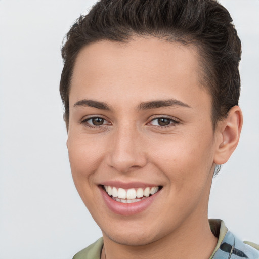 Joyful white young-adult female with short  brown hair and brown eyes