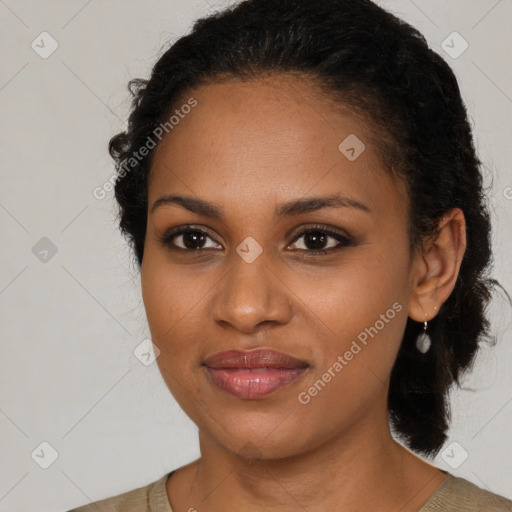 Joyful black young-adult female with medium  brown hair and brown eyes