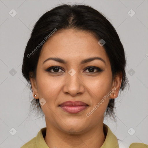 Joyful latino young-adult female with medium  brown hair and brown eyes