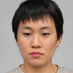 Neutral asian young-adult male with short  black hair and brown eyes