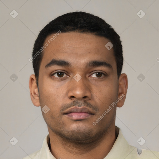 Neutral latino young-adult male with short  black hair and brown eyes