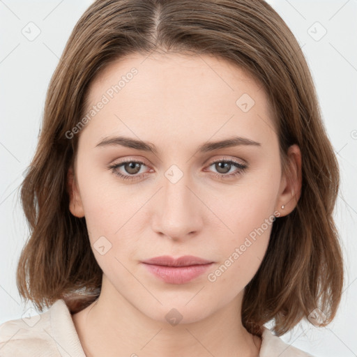 Neutral white young-adult female with medium  brown hair and brown eyes