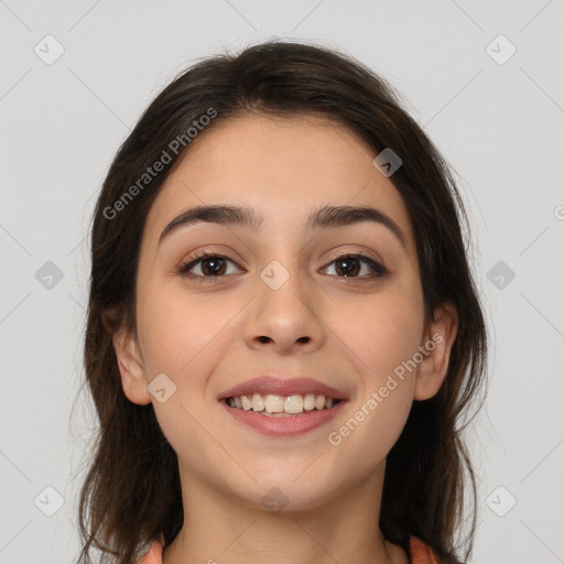 Joyful white young-adult female with long  brown hair and brown eyes