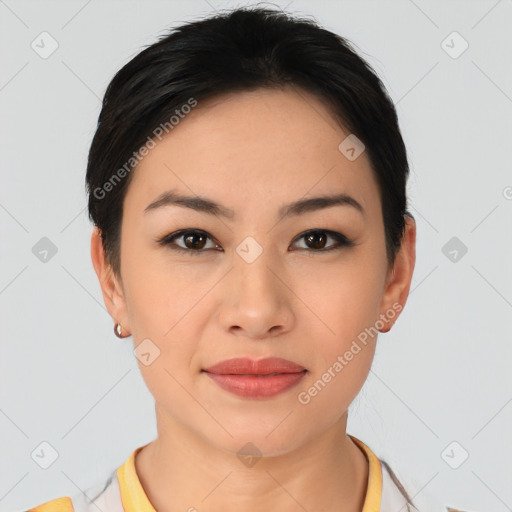 Joyful asian young-adult female with short  black hair and brown eyes