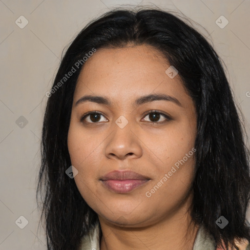 Joyful latino young-adult female with long  black hair and brown eyes