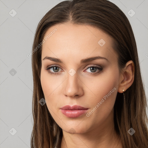 Neutral white young-adult female with long  brown hair and brown eyes