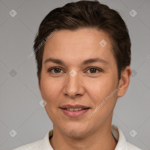 Joyful white adult female with short  brown hair and brown eyes