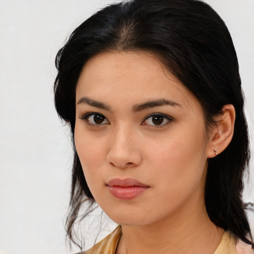 Neutral asian young-adult female with medium  brown hair and brown eyes