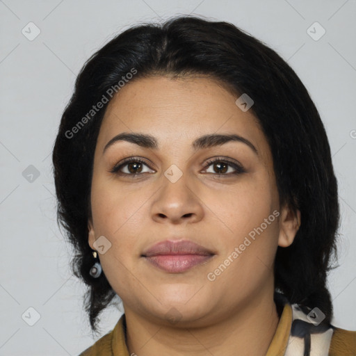 Joyful latino young-adult female with medium  brown hair and brown eyes