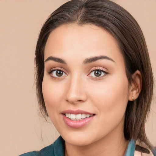 Joyful white young-adult female with medium  brown hair and brown eyes