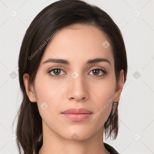 Neutral white young-adult female with long  brown hair and brown eyes