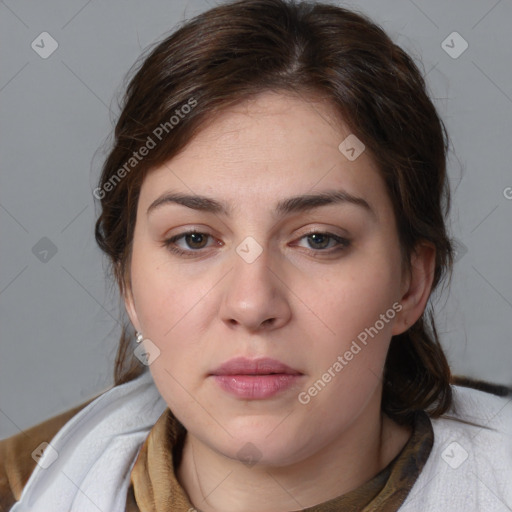 Neutral white young-adult female with medium  brown hair and brown eyes