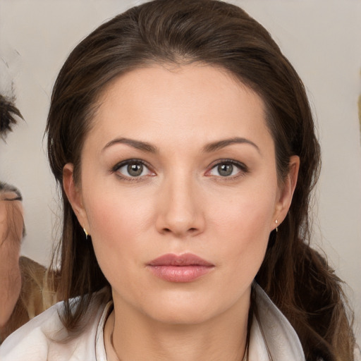 Neutral white young-adult female with medium  brown hair and brown eyes