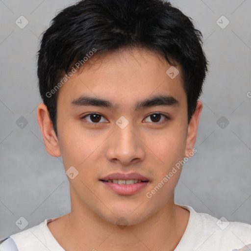 Joyful asian young-adult male with short  brown hair and brown eyes