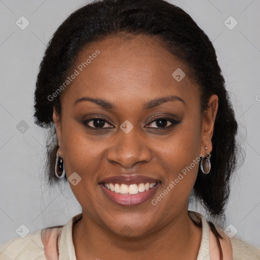 Joyful latino young-adult female with medium  brown hair and brown eyes