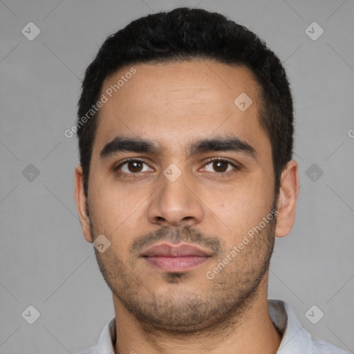 Neutral latino young-adult male with short  black hair and brown eyes