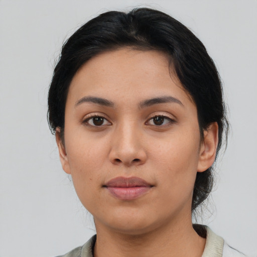 Neutral asian young-adult female with medium  black hair and brown eyes