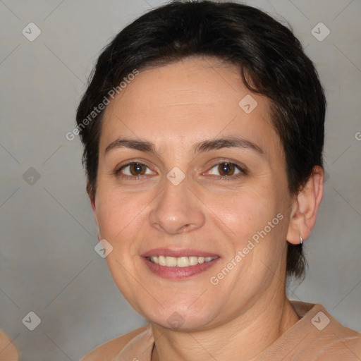 Joyful white adult female with short  brown hair and brown eyes