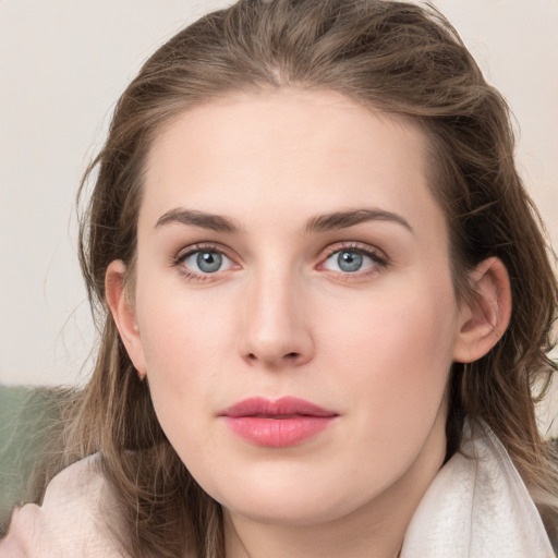 Neutral white young-adult female with long  brown hair and grey eyes