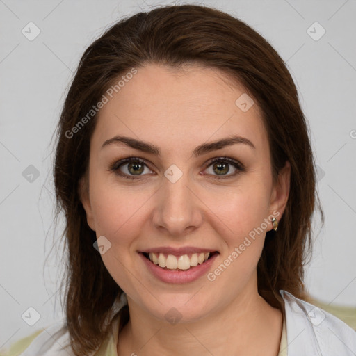 Joyful white young-adult female with medium  brown hair and green eyes