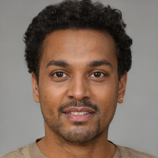 Neutral latino young-adult male with short  brown hair and brown eyes