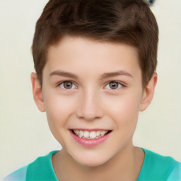 Joyful white child male with short  brown hair and brown eyes