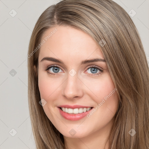 Joyful white young-adult female with long  brown hair and grey eyes