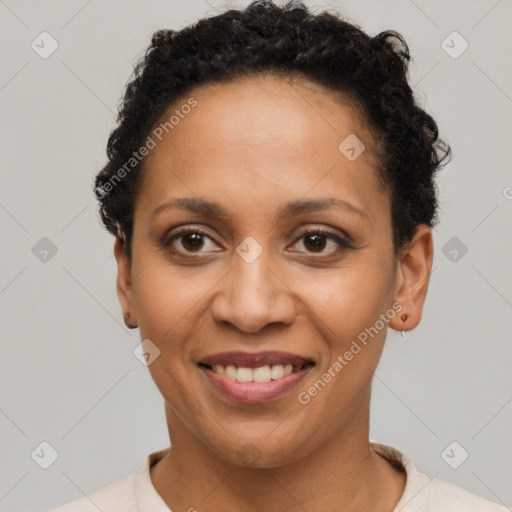 Joyful latino young-adult female with short  brown hair and brown eyes